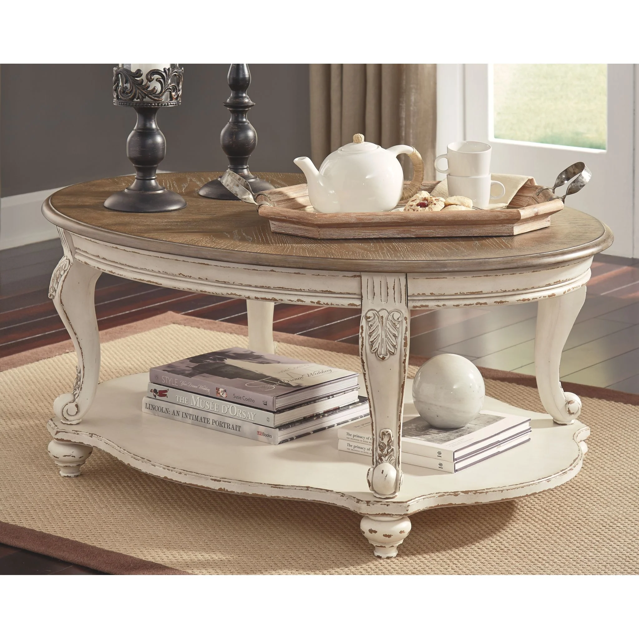 Realyn Oval Coffee Table - Image 2